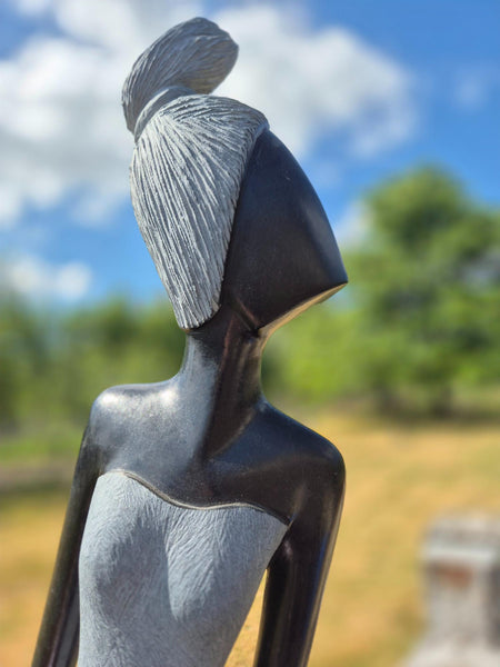 vrouwenfiguur, stenen beeld, tuinbeeld, julius murenza, wereldbeeld driegoten