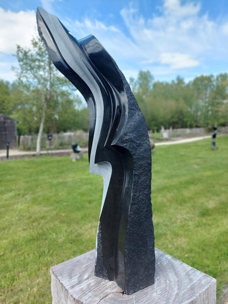 abstract stone sculpture, Wereldbeeld driegoten