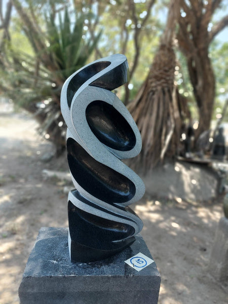 garden sculptures in stone, statues, abstract shapes