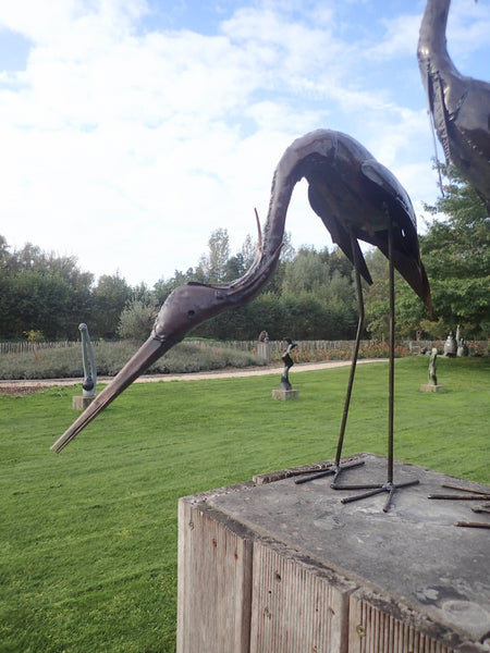etende reiger, feeding heron, metal art, yard art, gardensculpture