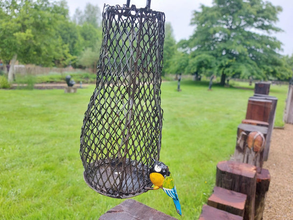 paddestoel vogel voerbakje in metaal, hangend model