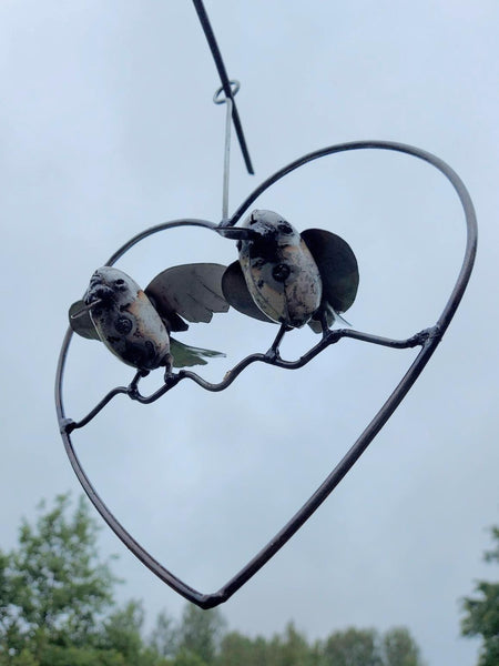 2 vogeltjes in een hart