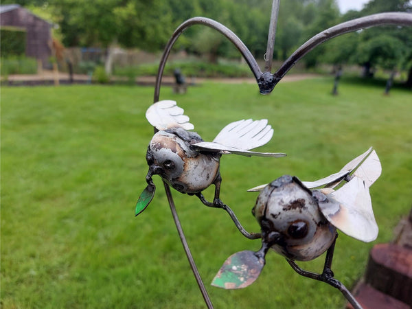 2 vogeltjes in een hart