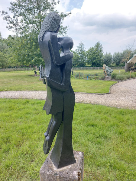 stone sculpture couple, massive garden statue