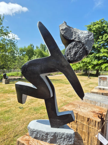 dancer in stone, cute sculpture, shona art zimbabwe