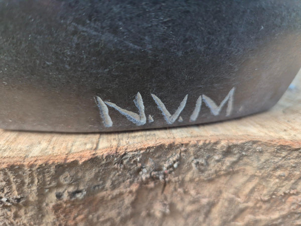 signature in stone from Nesbert Masunda