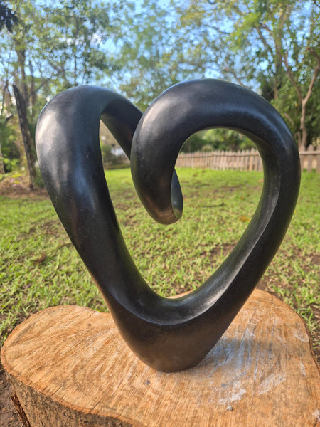 heart shaped stone sculpture, shona art zimbabwe