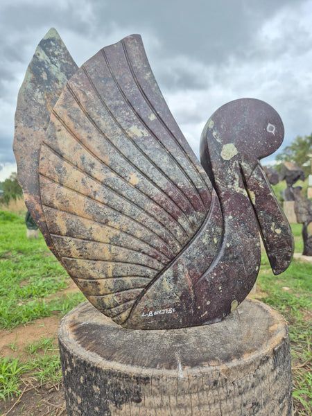 bird in cobalt serpentine stone, from Lovemore Bonjisi, shona art zimbabwe
