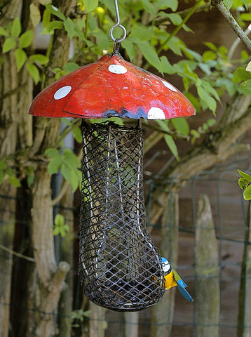 vogel voederbakje, in de vorm van een paddenstoel, metaalkunst, gerecycle metaal en olievaten, handcrafted in zimbabwe, beeldentuin wereldbeeld driegoten hamme