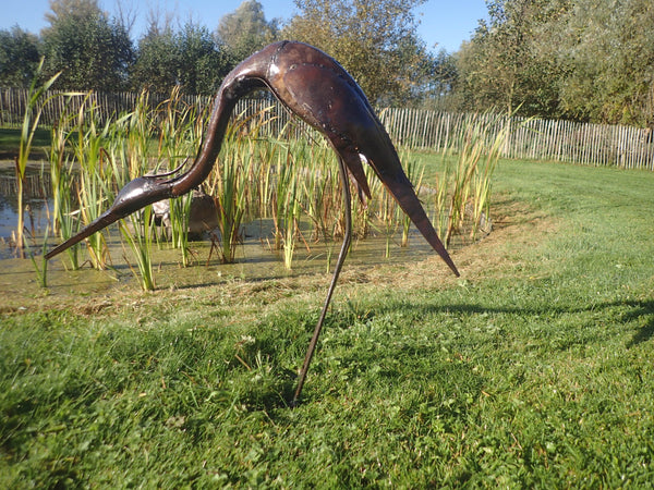 Tuinbeeld :  etende reiger