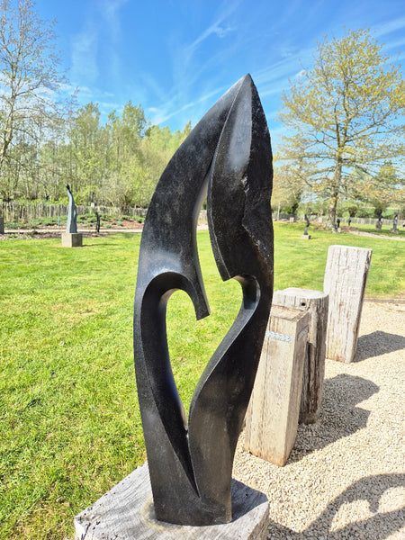 stone statue, abstract creation, large collection of garden sculptures at wereldbeeld in belgium, shipping worldwide