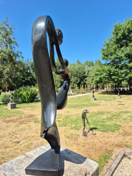 sculptures in stone from zimbabwe, wereldbeeld belgium, large collection hand picked unique statues