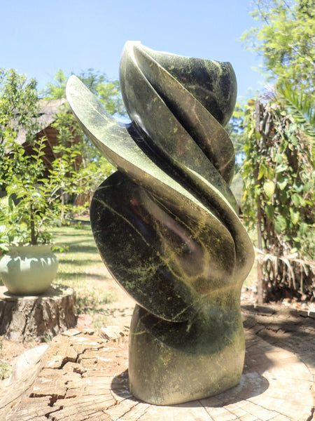 hedendaagse tuinbeelden, modern en strak in steen