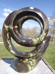 abstracte ronde vorm beeldhouwwerk in steen, stone sculpture, hamme driegoten
